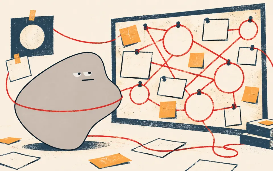 The grey mascot at a board full of notes and strings